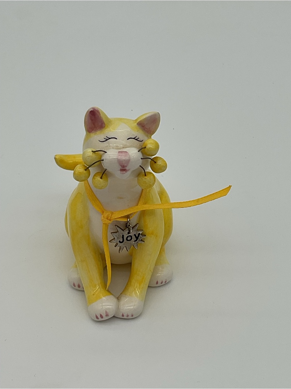 Vintage Lacombe Yellow Ceramic Cat Figurine with 'JOY' Charm